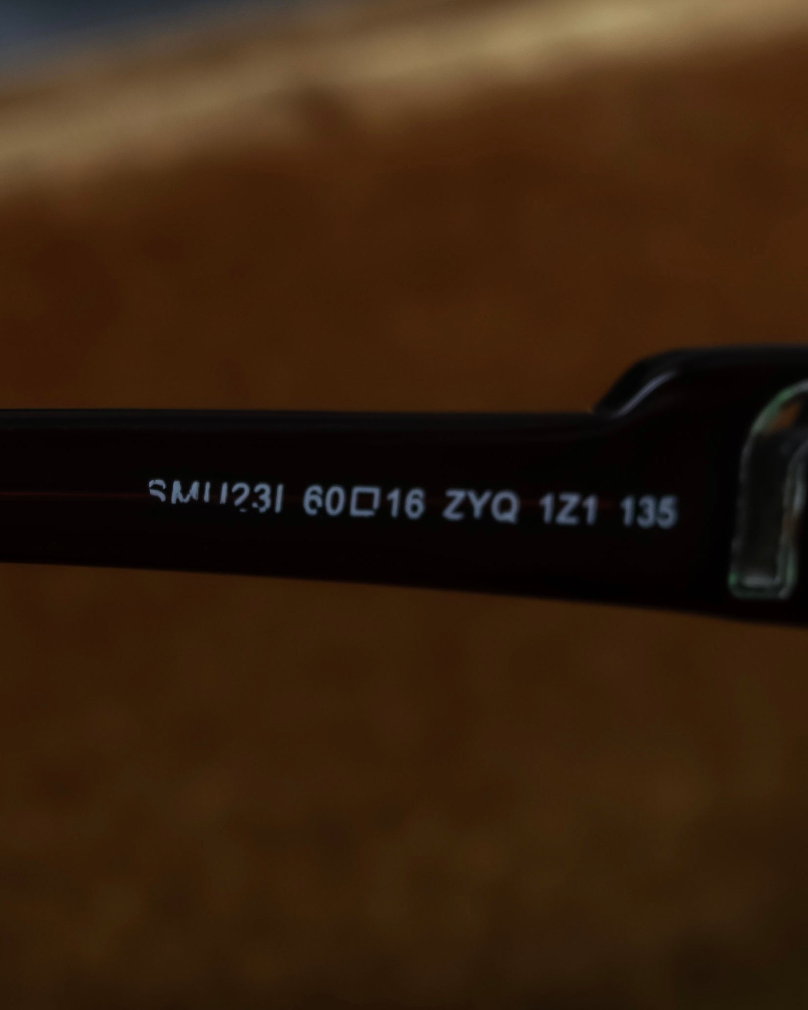 "Miu Miu" reddish brown sporty sunglasses