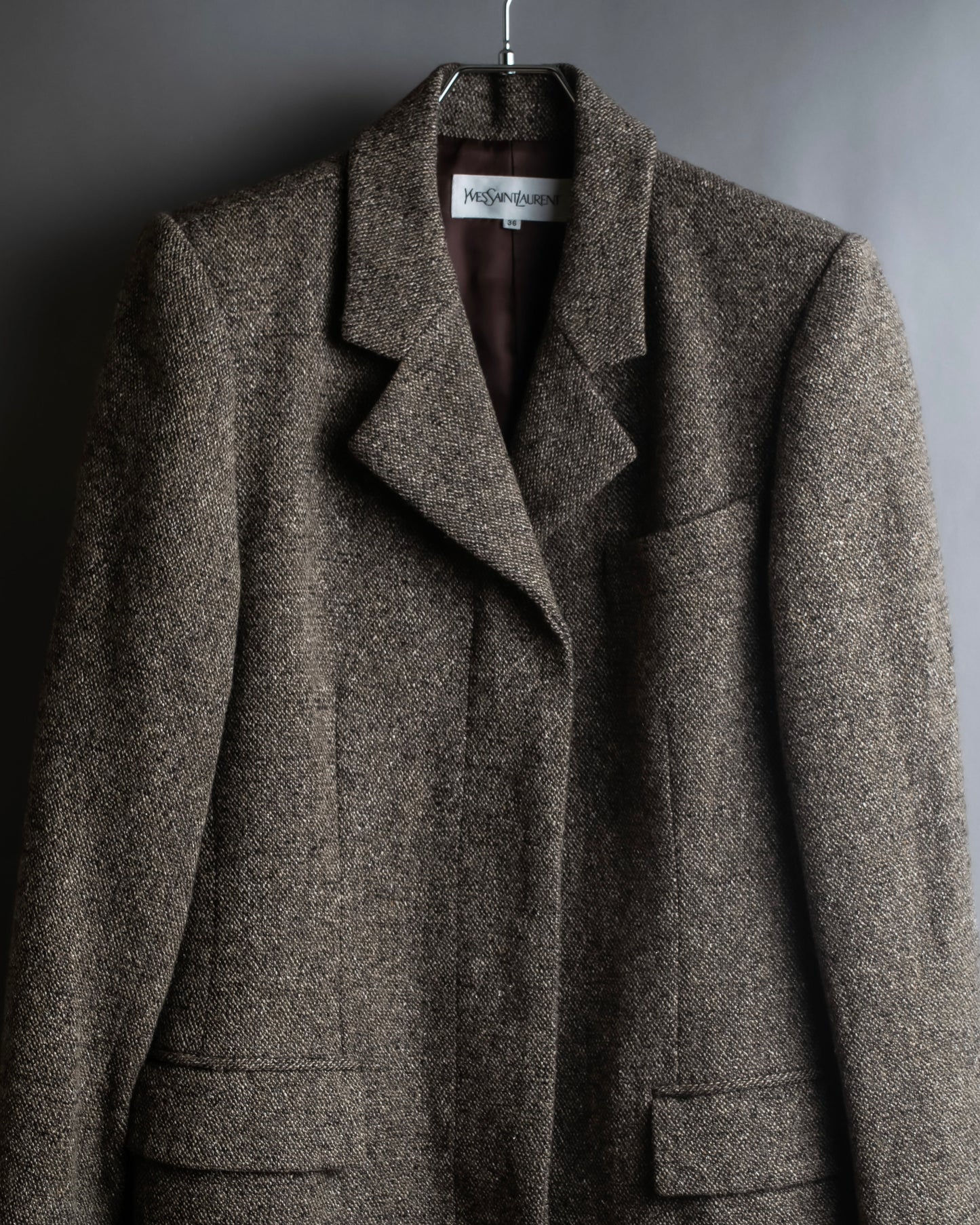 "Yves Saint Laurent Rive Gauche"
Fly front tweed chester coat