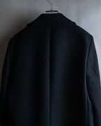 "JOHN LAWRENCE SULLIVAN"
 Large lapel double-breasted mid length coat