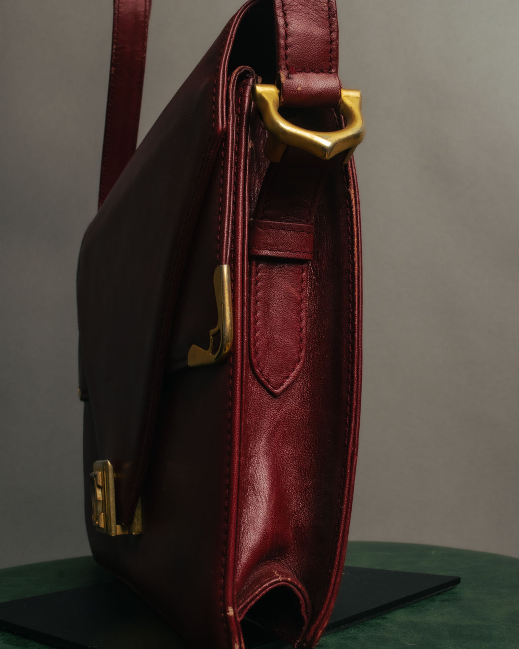 “Cartier” 80’s-90’s Must de Cartier burgundy leather shoulder bag