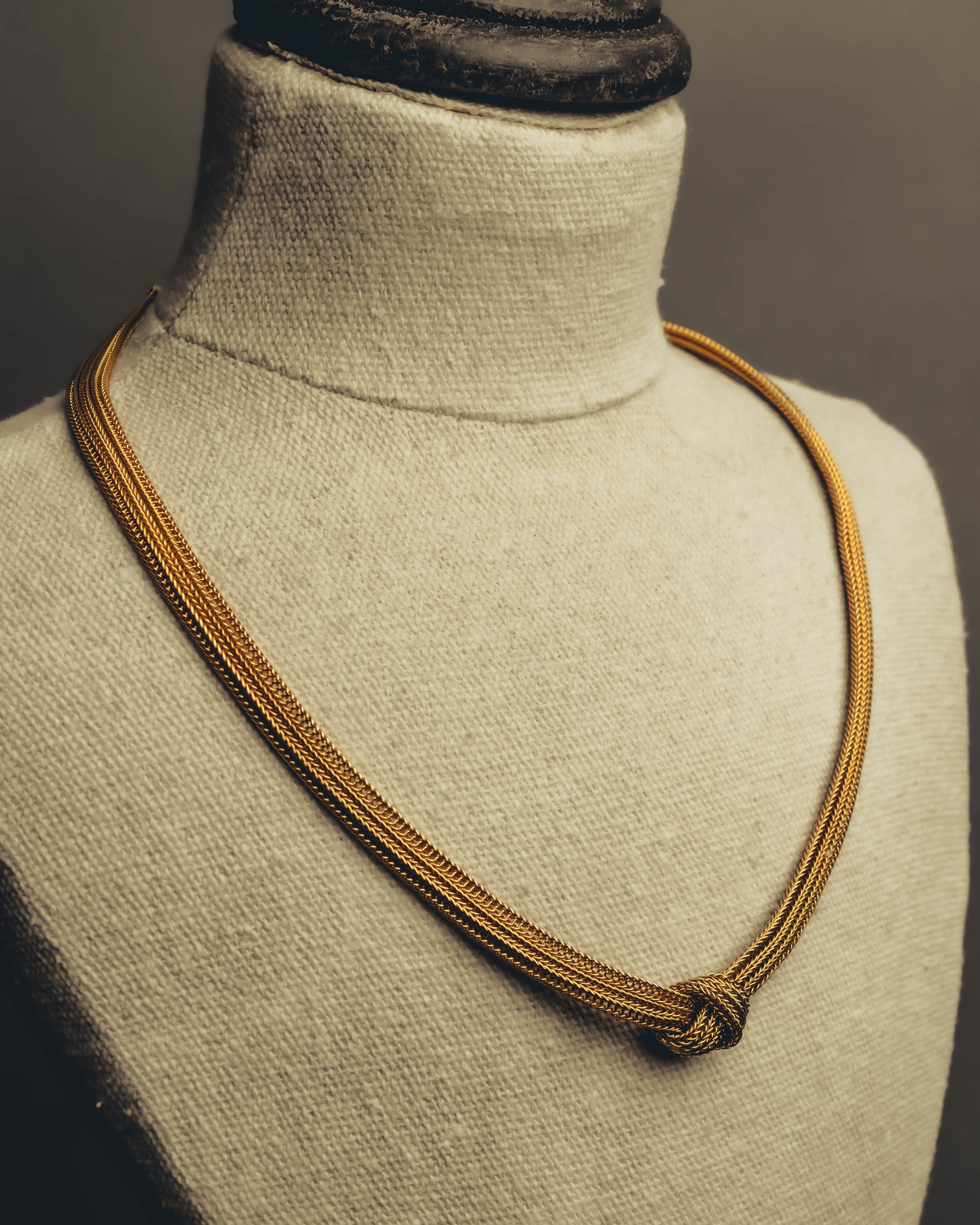 "Christian Dior" Gold tone braided knot costume jewelry necklace