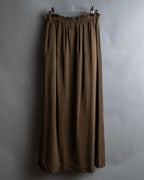 "ISSEY MIYAKE" Gathered waist detail button slide flared skirt