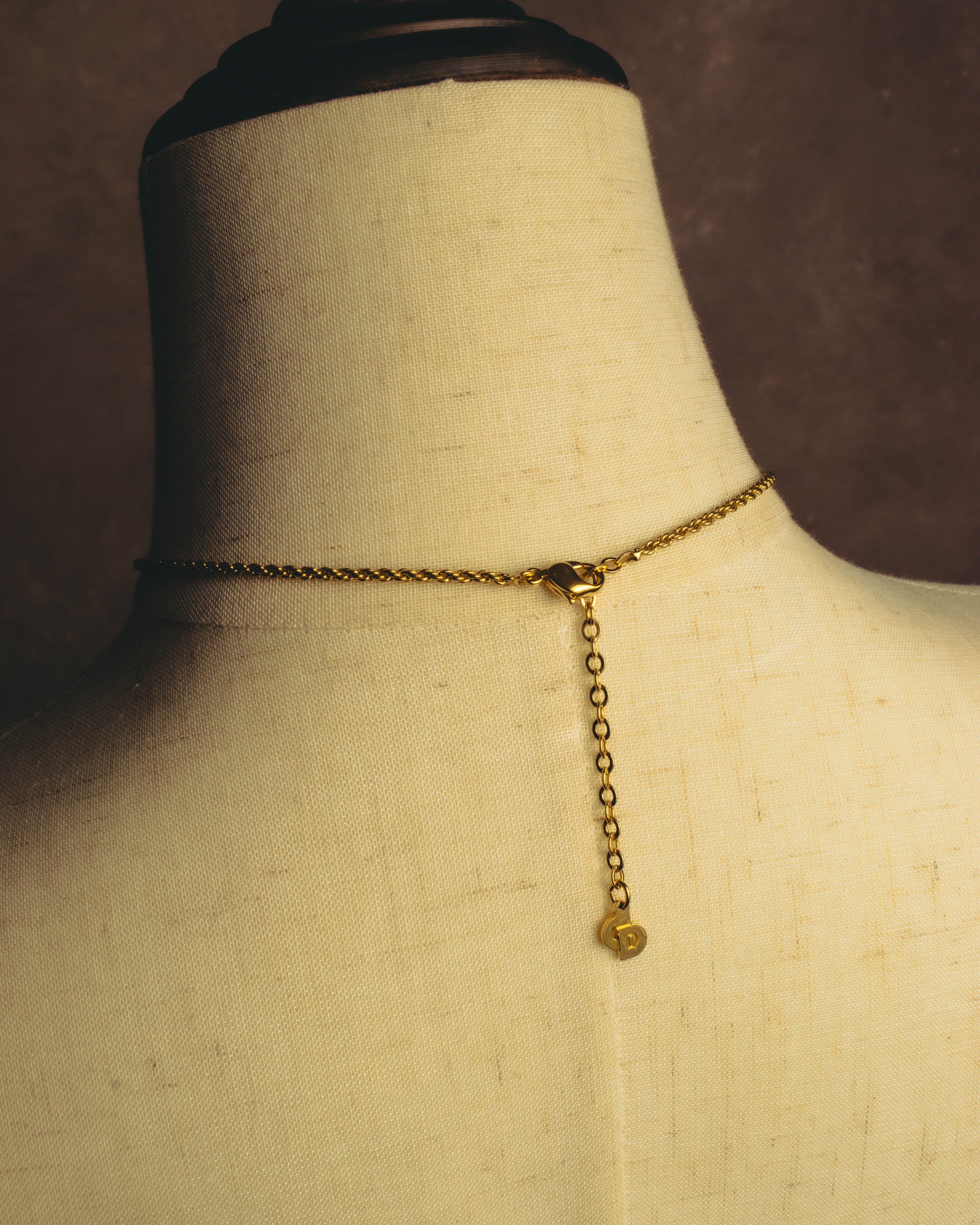 "Christian Dior" 80's-90's Gold tone bottle pendant necklace