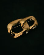 “Yves Saint Laurent” 80’s–90’s Sculptural chain motif brooch