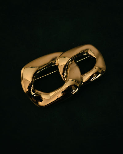 “Yves Saint Laurent” 80’s–90’s Sculptural chain motif brooch