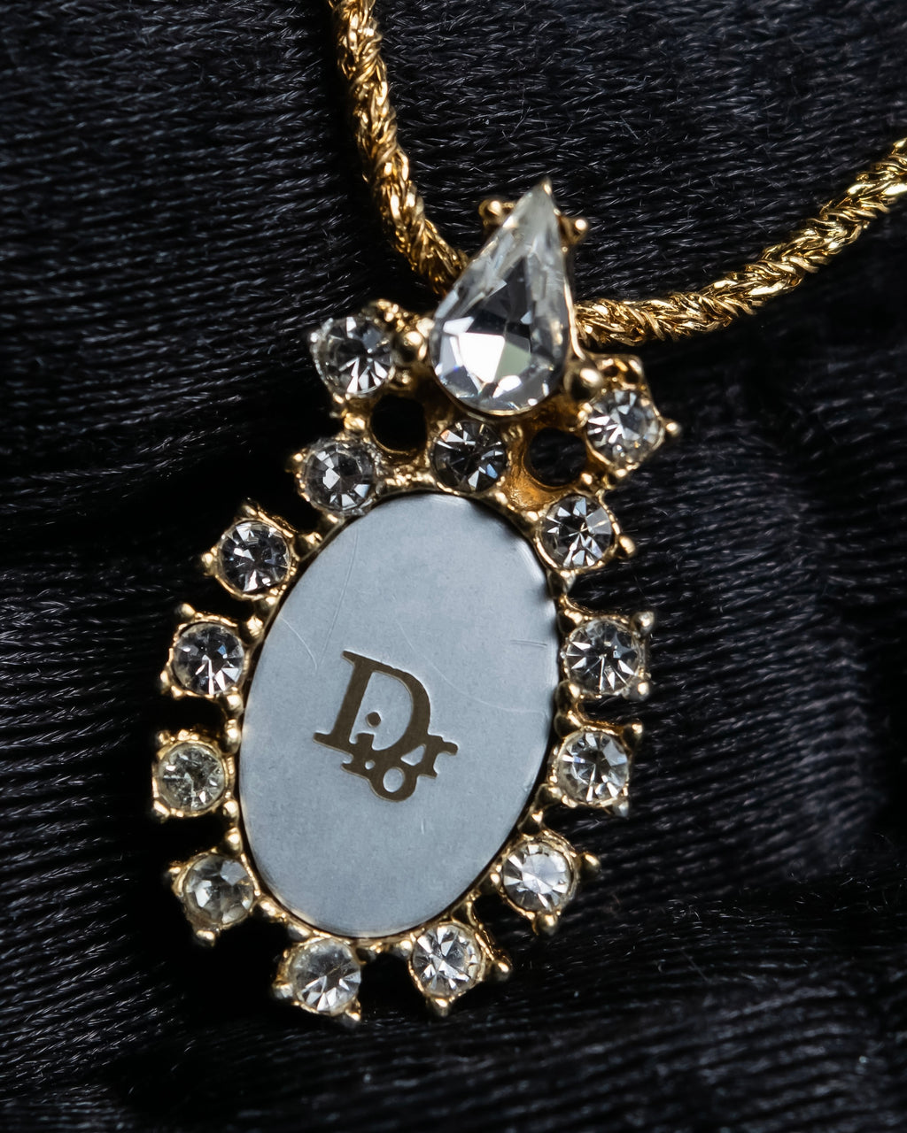 "Christian Dior" Trotter logo engraved gold pendan