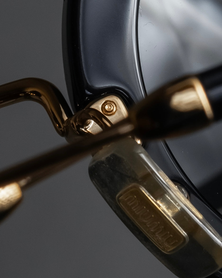 "MIU MIU" Round frame statement sunglasses