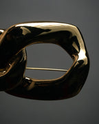 “Yves Saint Laurent” 80’s–90’s Sculptural chain motif brooch