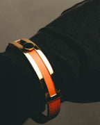 "Hermès" 00's Vibrant orange leather bracelet