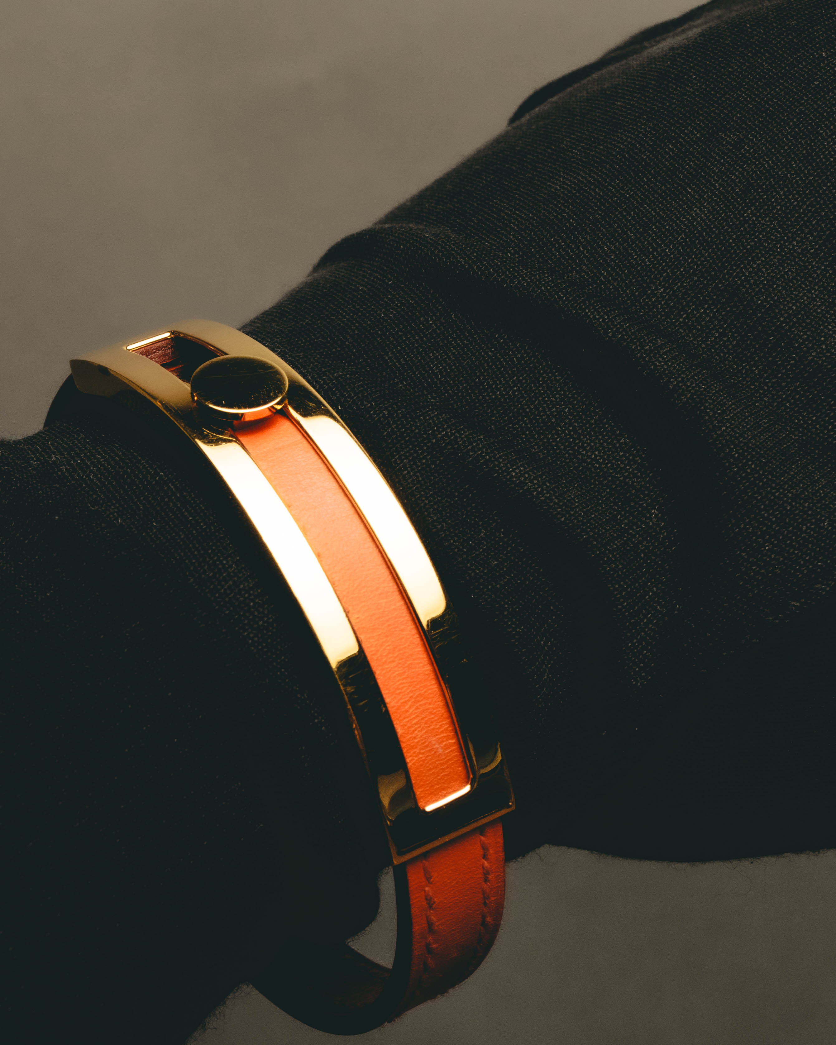 "Hermès" 00's Vibrant orange leather bracelet
