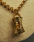 “NINA RICCI” Late 80’s-90’s gold tone openwork pendant necklace
