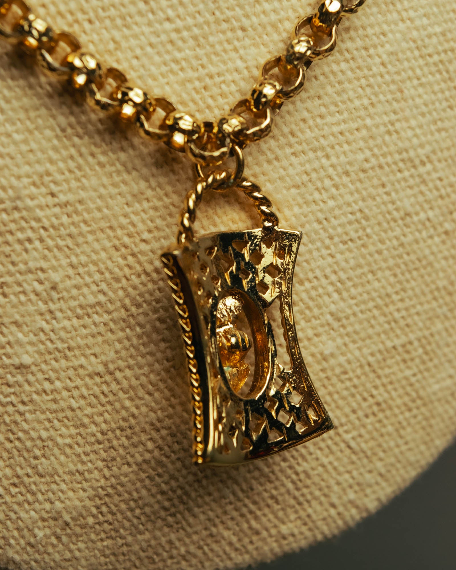 “NINA RICCI” Late 80’s-90’s gold tone openwork pendant necklace