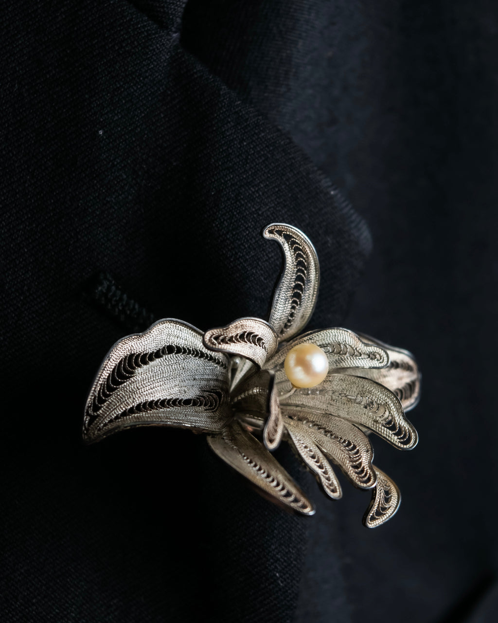 "Vintage petal motif broach"