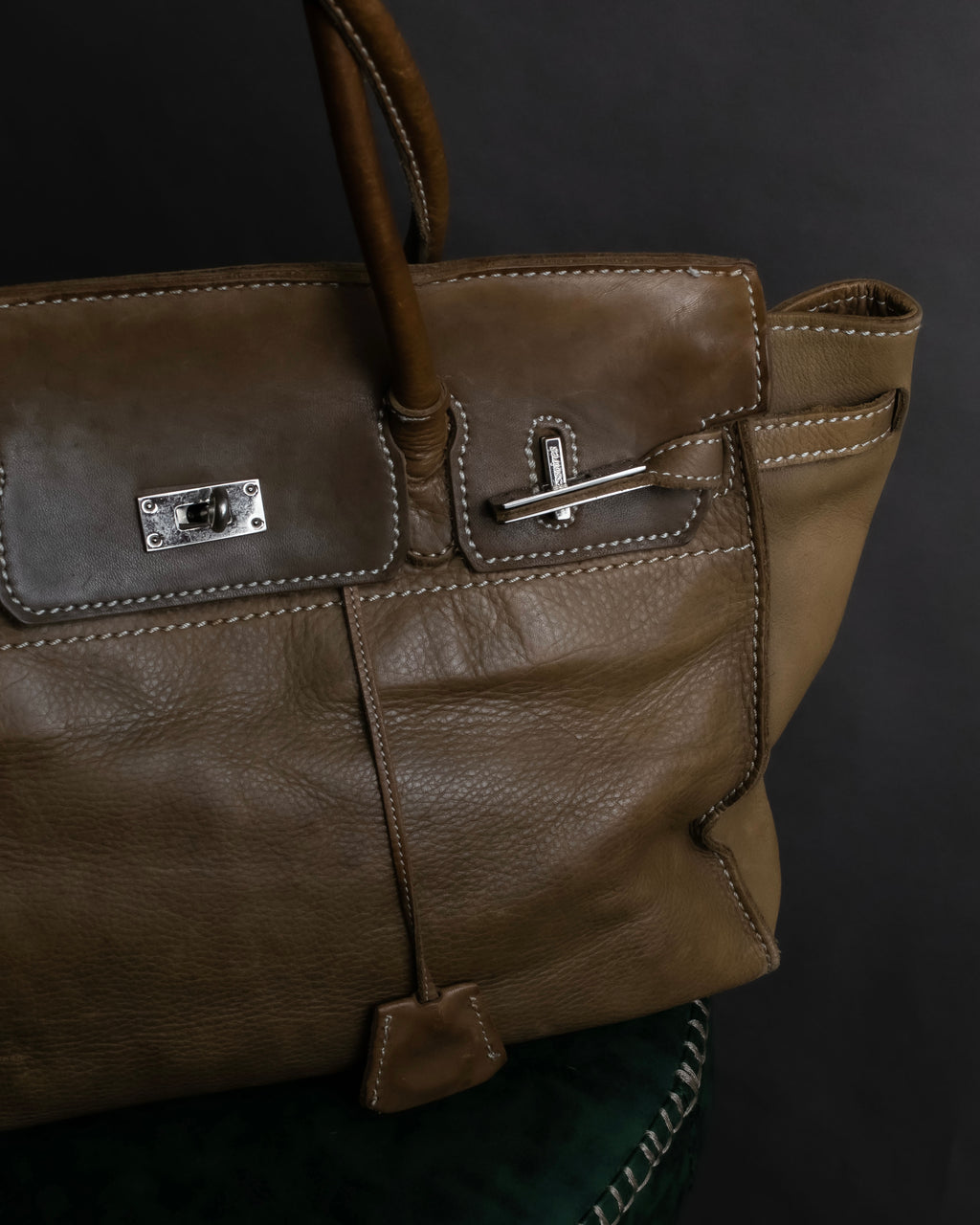 "Mademoiselle Accessories"
 Silver parts design leather one handle bag