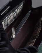 "BURBERRY" Trapezoidal embossed leather one-handle bag