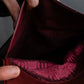 "Cartier" Texture changing bordeaux colored leather shoulder bag