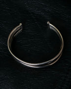 “PHILIPPE AUDIBERT” Crossed 5 line silver bangle