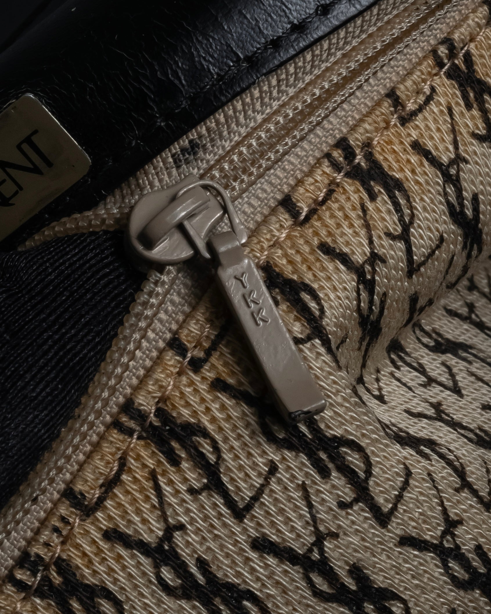 "YVES SAINT LAURENT" 80's-90's Logo engraved tassel detail bag