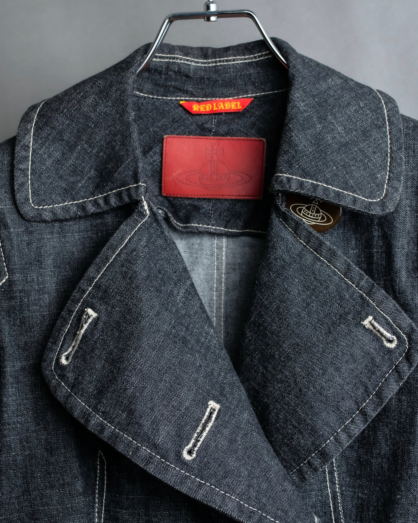 "Vivienne Westwood RED LABEL" Asymmetrical button design mid length denim coat