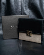 "GUCCI" Canvas and leather bi-fold wallet