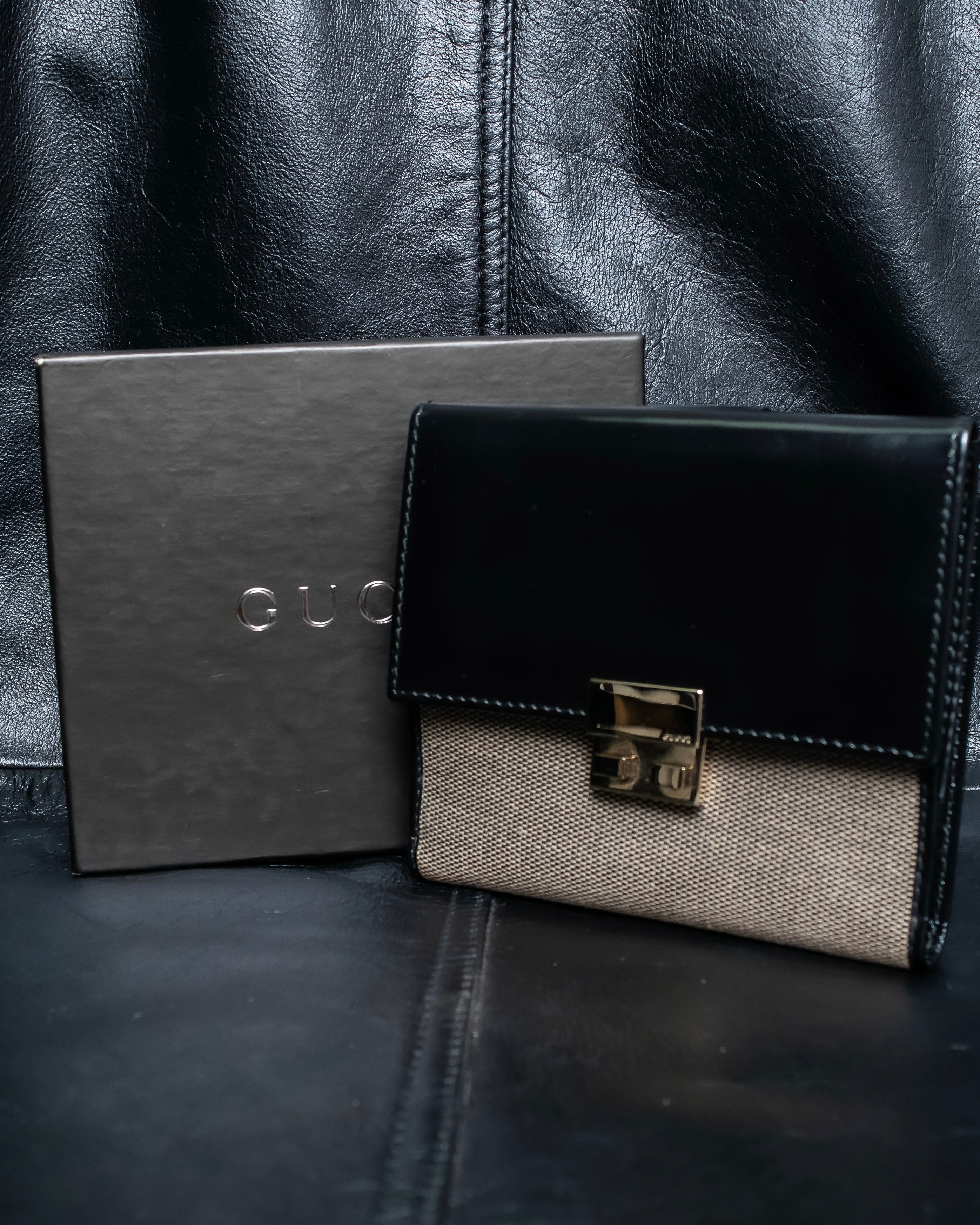 "GUCCI" Canvas and leather bi-fold wallet