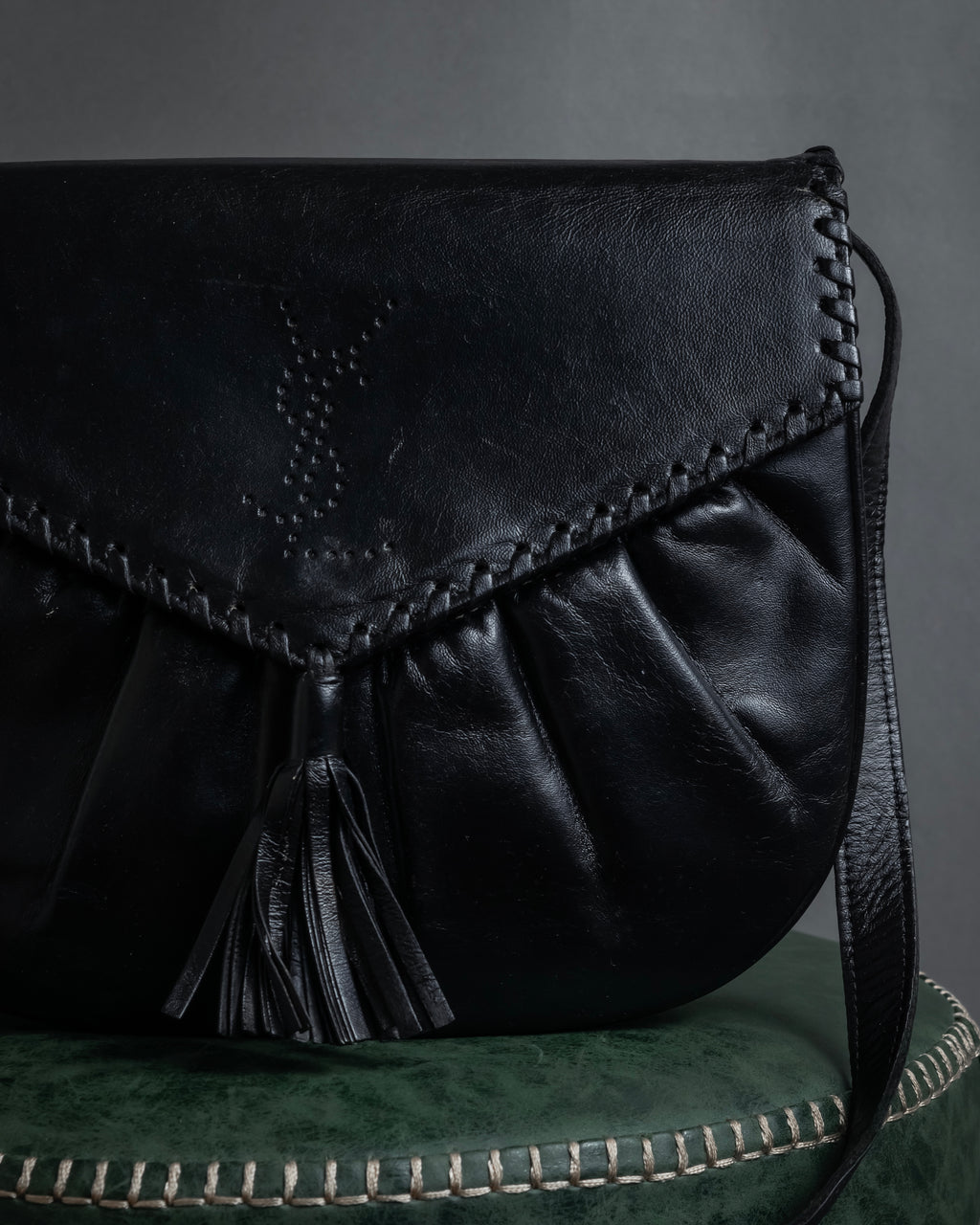 "YVES SAINT LAURENT" 80's-90's Logo engraved tassel detail bag