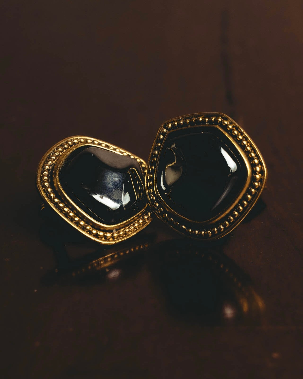 "Yves Saint Laurent" 80's-90's Sculptural black cabochon clip-on earrings