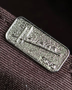 "HAMANO TOKYO" Trapezoidal shape iconic hardware leather one handle bag