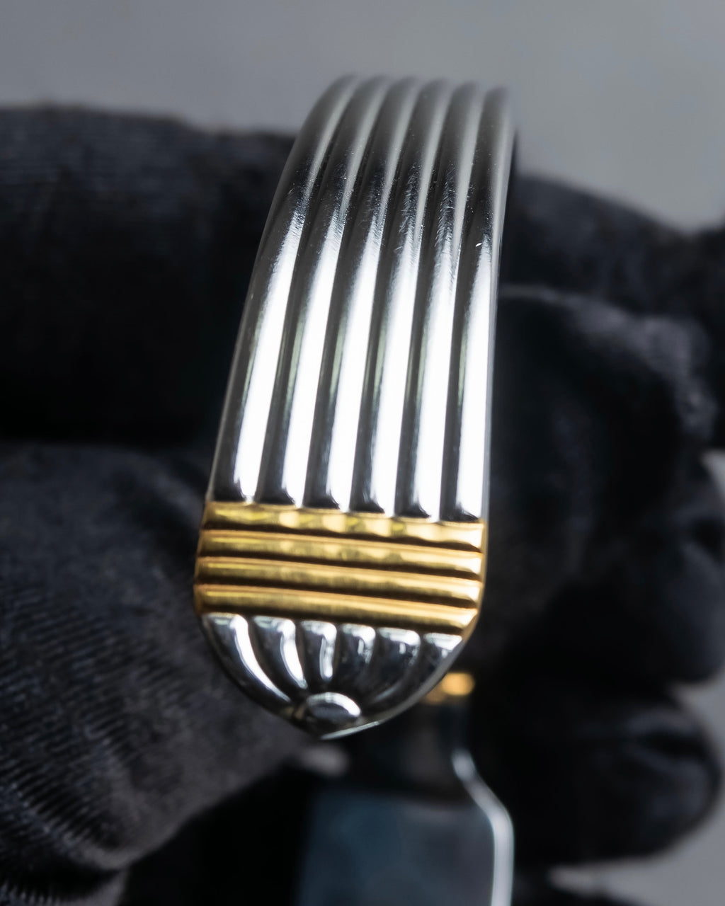 "Christian Dior" Ribbed design gold combination polished silver bangle