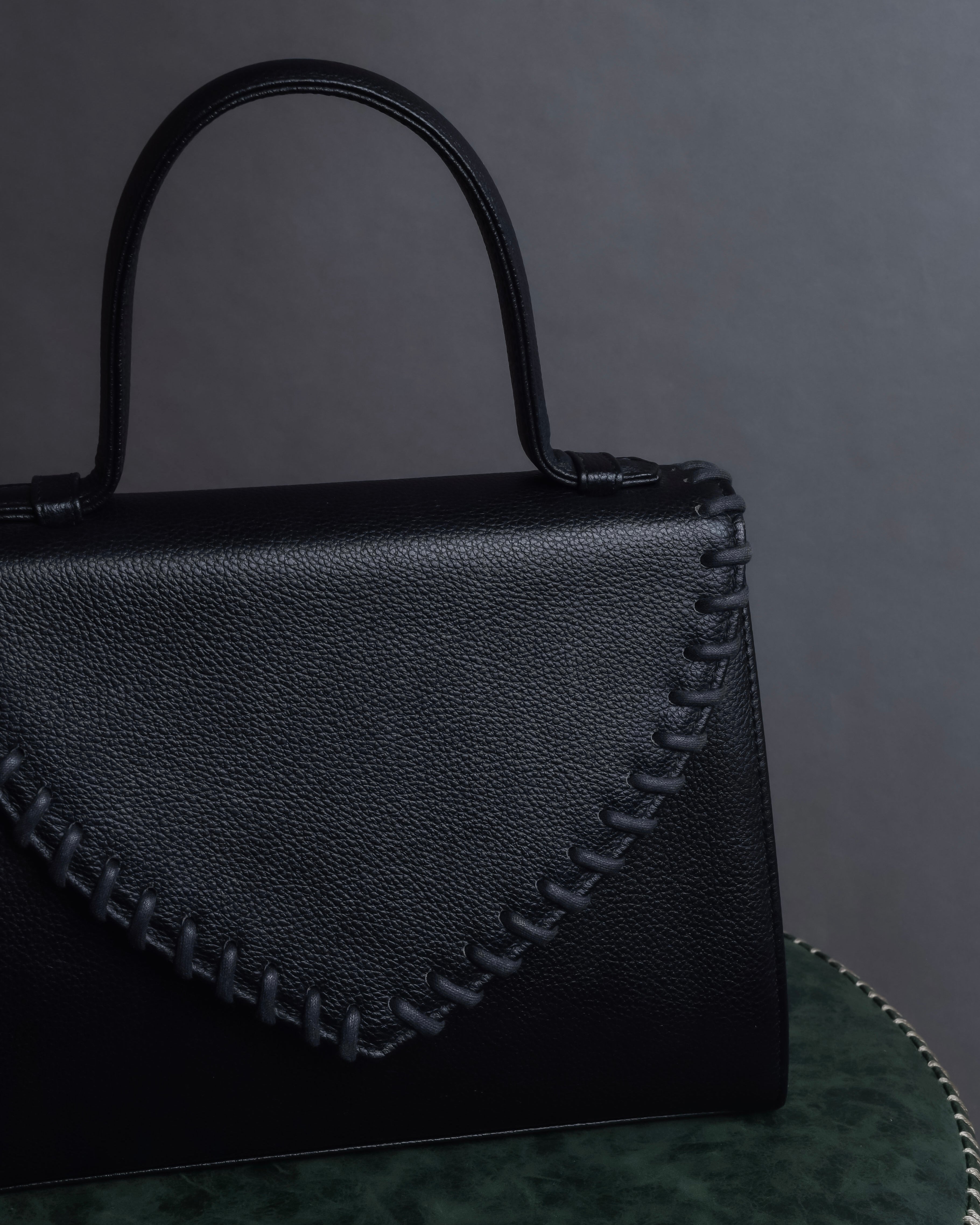 "YVES SAINT LAURENT" Hand stitched design trapezoid leather bag