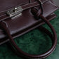 "HAMANO TOKYO" Trapezoidal shape iconic hardware leather one handle bag