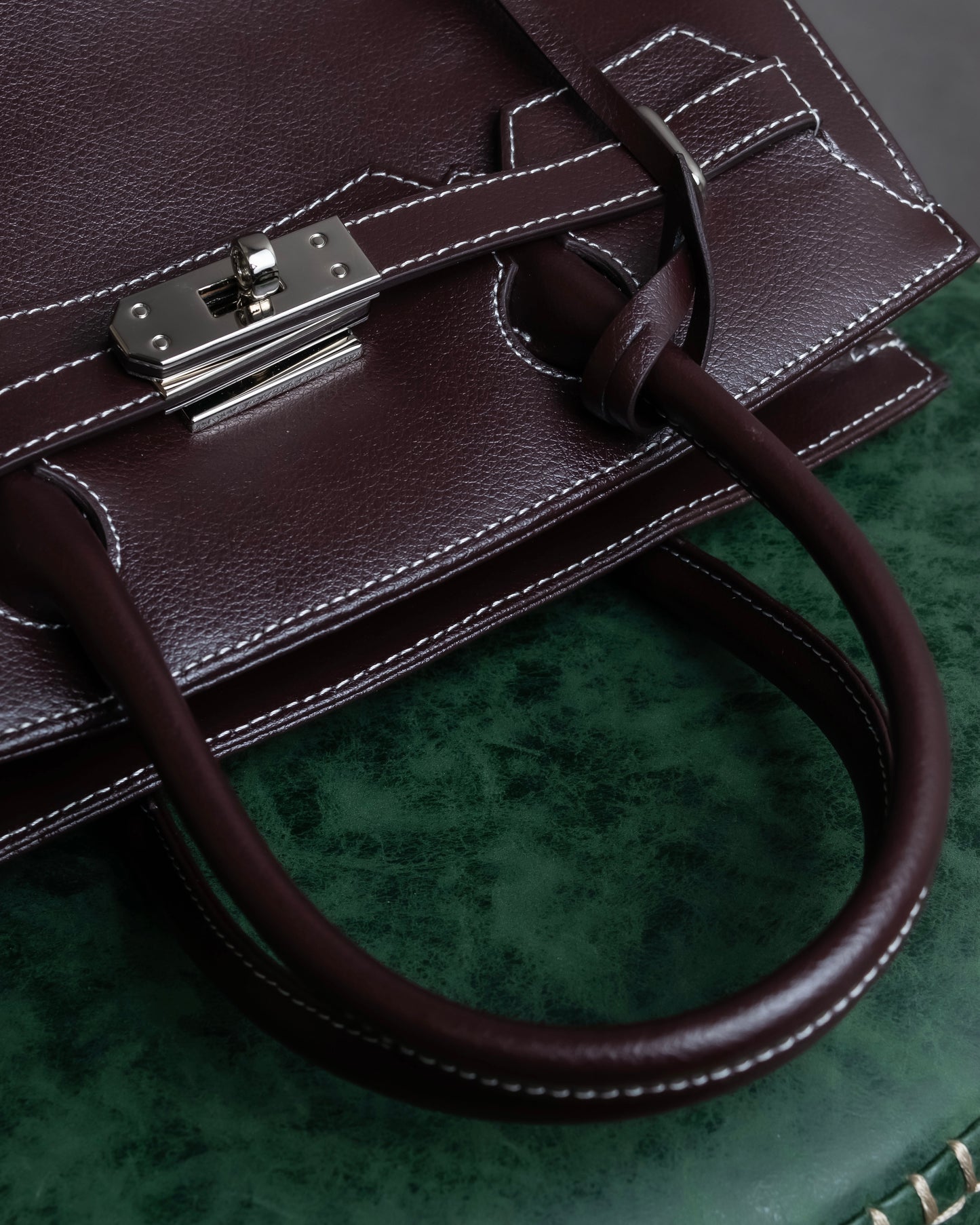 "HAMANO TOKYO" Trapezoidal shape iconic hardware leather one handle bag