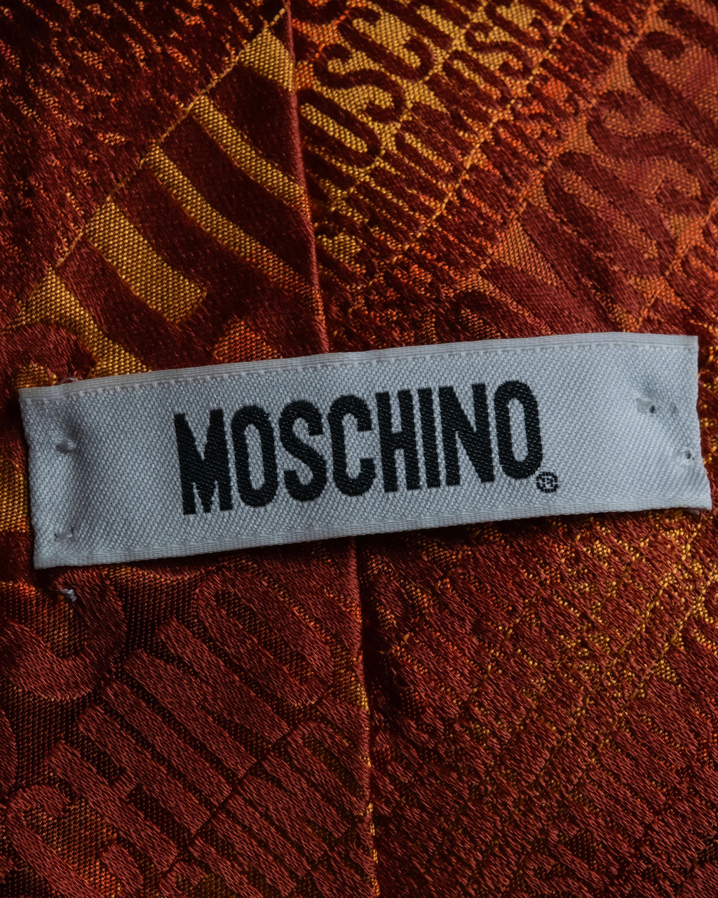 "MOSCHINO" Logo engraved patterned glossy silk necktie