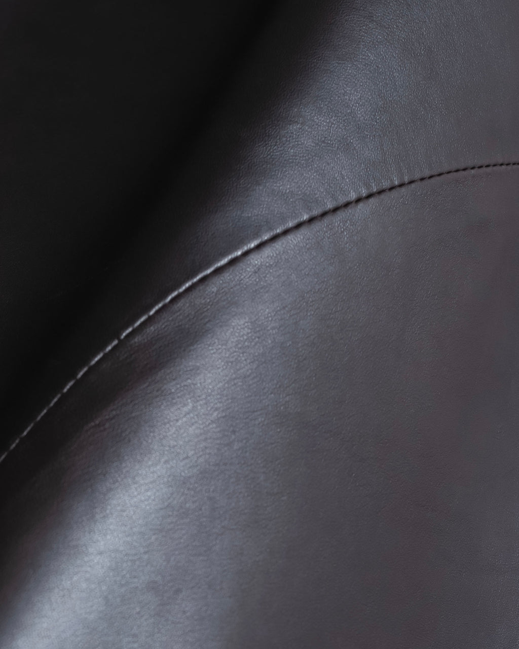 "HARVEY LOGAN" Diagonal cut design lamb leather flare skirt