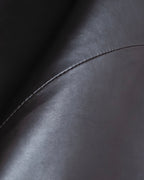 "HARVEY LOGAN" Diagonal cut design lamb leather flare skirt