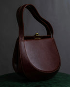 "Salvatore Ferragamo" Half-moon shaped Bordeaux color leather shoulder bag