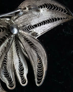 "Vintage petal motif broach"