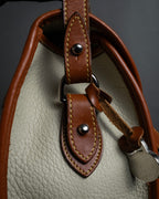 "Dooney & Bourke" Patch front design Two-tone leather shoulder bag