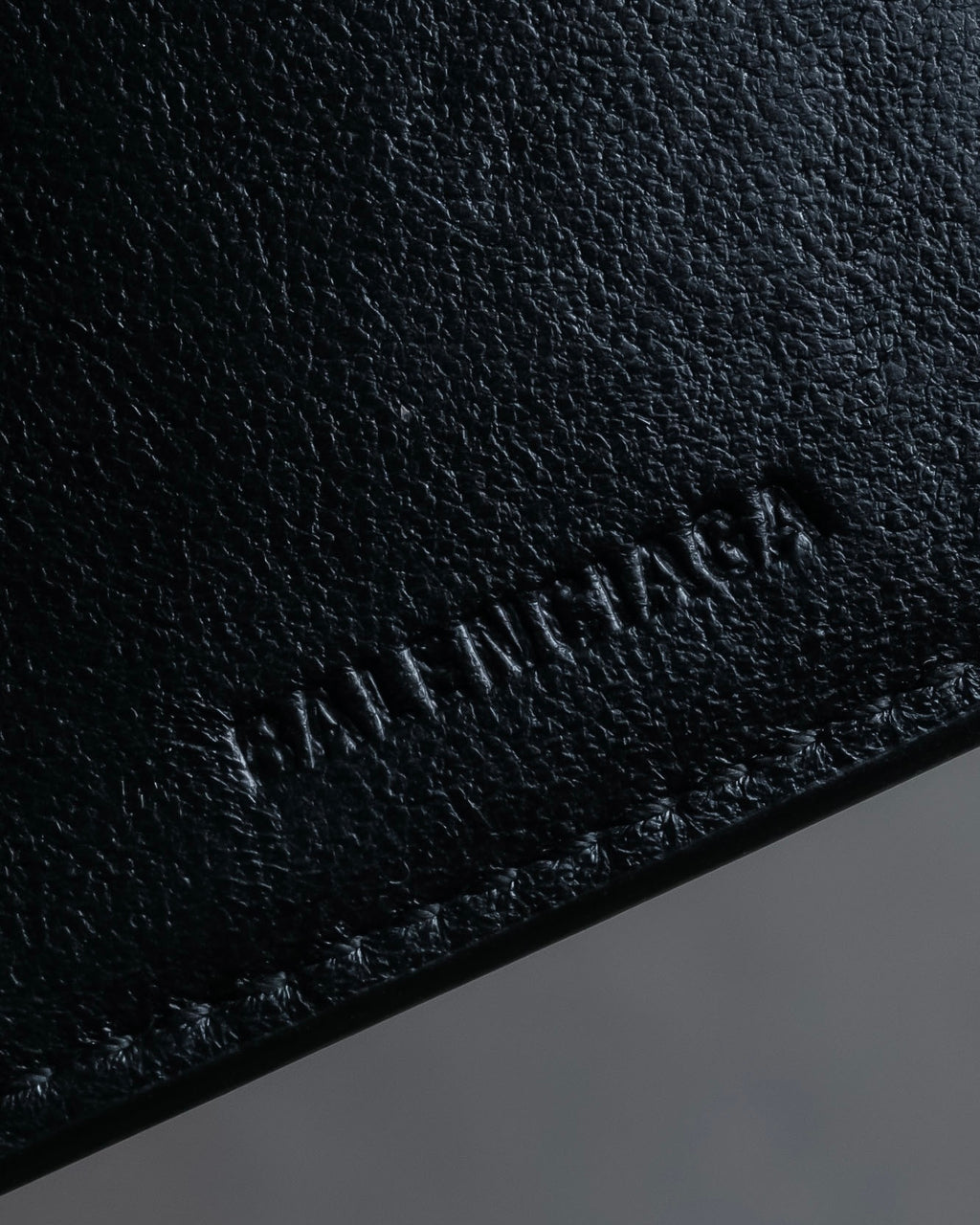 "BALENCIAGA" Logo engraved compact leather tri-fold wallet