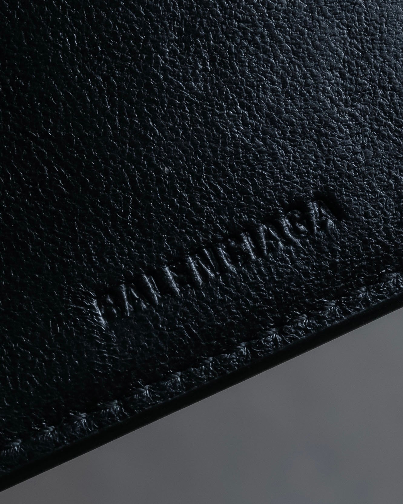 "BALENCIAGA" Logo engraved compact leather tri-fold wallet