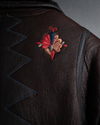 “KENZO” 80’s Folkloric shearling-lined leather long coat