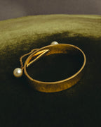 "Chloé" 2010's Gold tone pearl hinged cuff bracelet