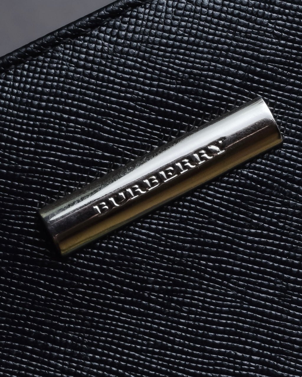 "BURBERRY" Trapezoidal embossed leather one-handle bag