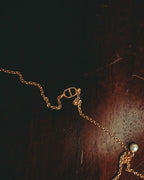 “Christian Dior” 2019-2025 Gold floral charm necklace with pearl accents