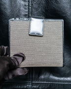 "GUCCI" Canvas and leather bi-fold wallet