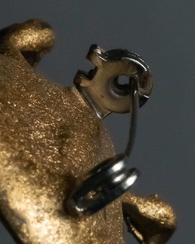 "Jerry Robertson design clock motif brooch"