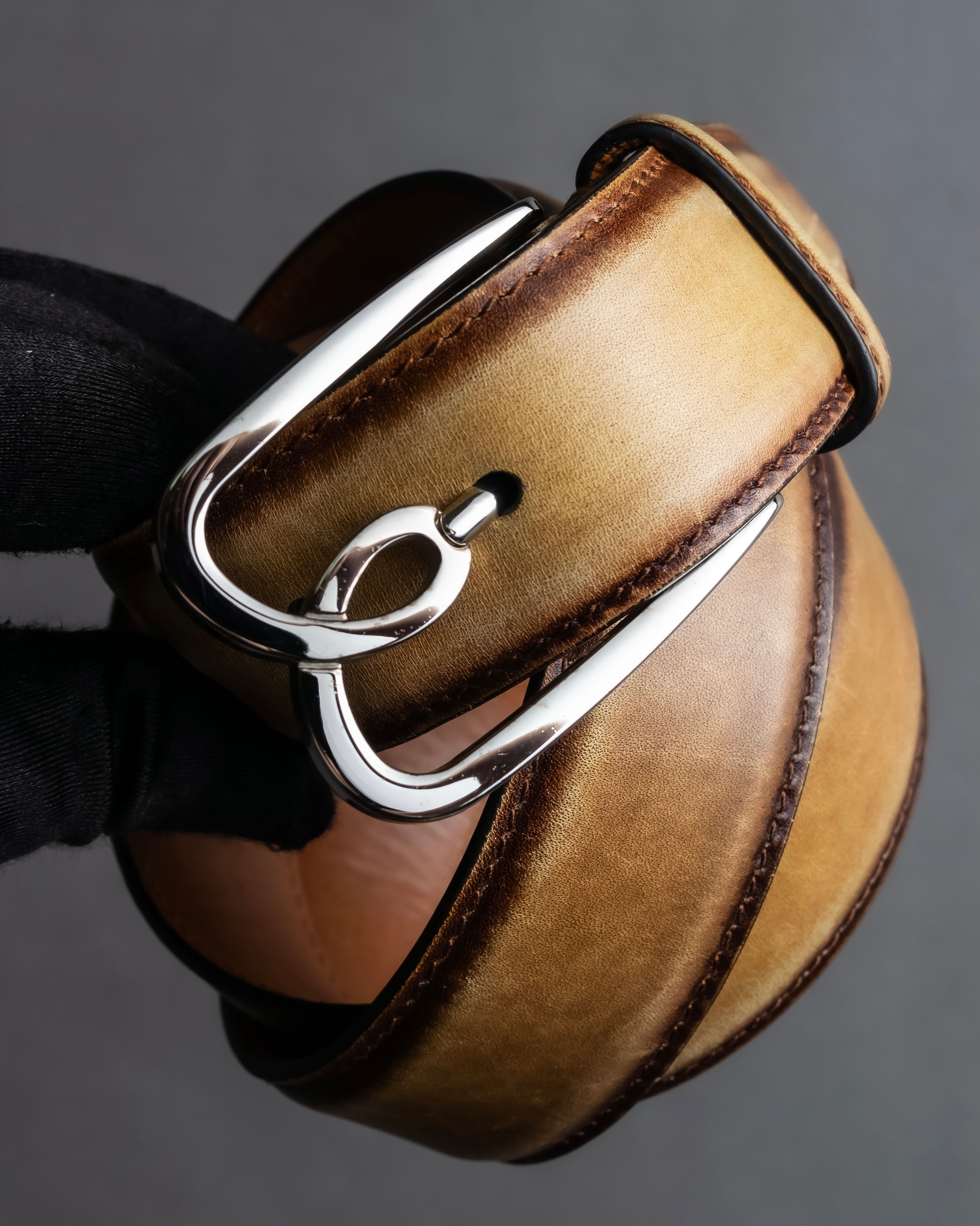 "Berluti" Patina finish curved buckle leather belt