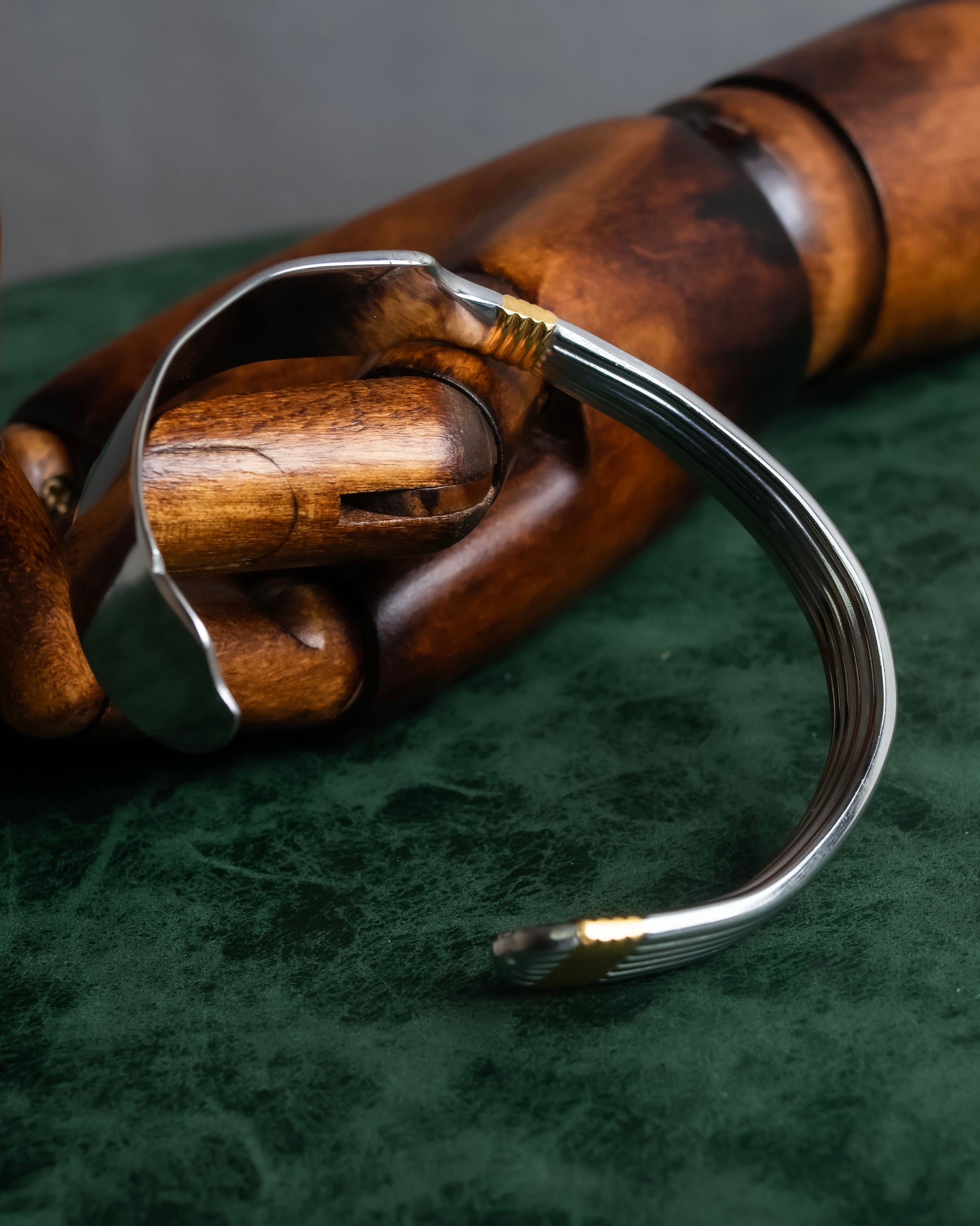 "Christian Dior" Ribbed design gold combination polished silver bangle