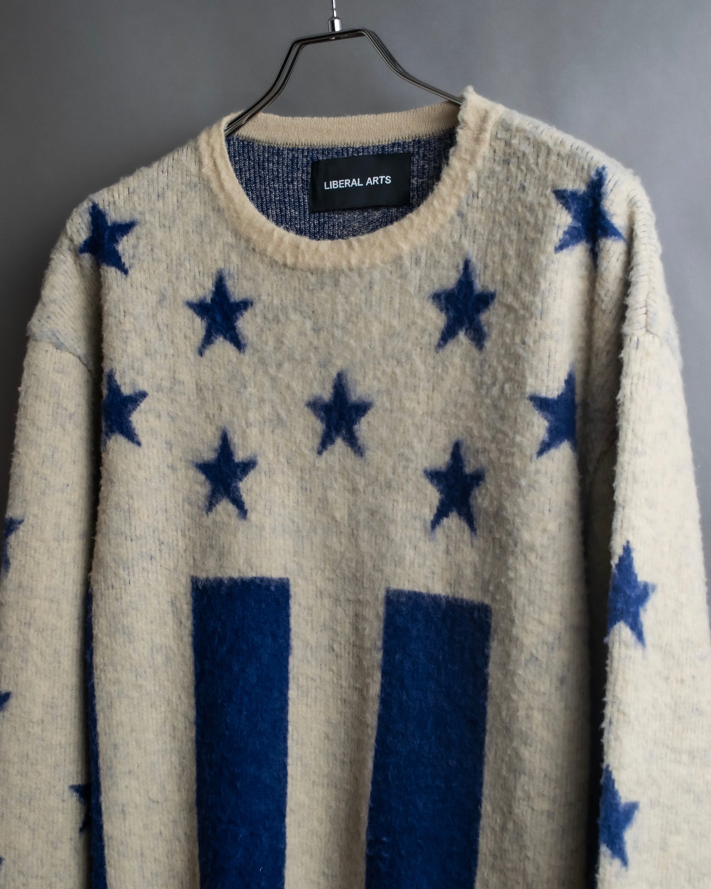 "LIBERAL ARTS" Star pattern oversized knit pullover