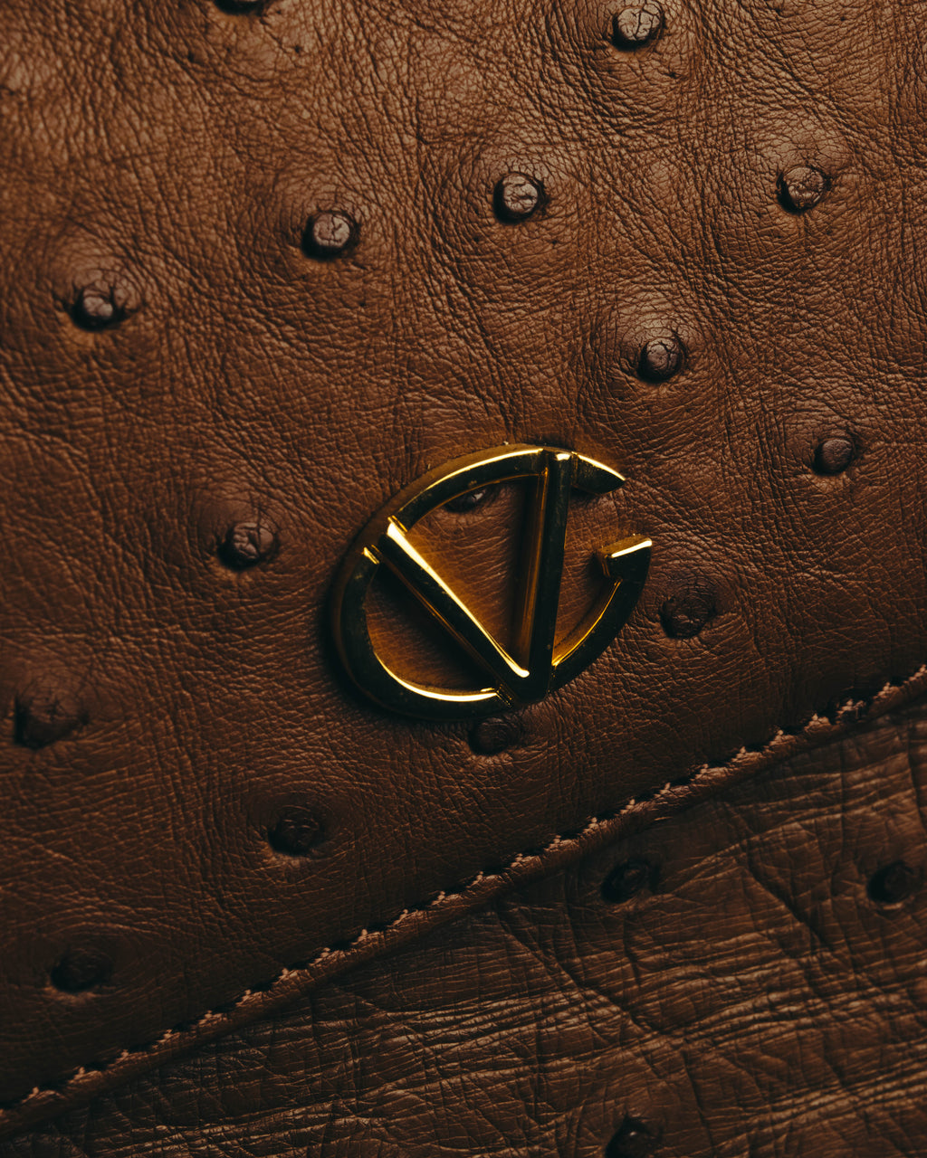 “GIOVANNI VALENTINO” Structured ostrich top handle bag